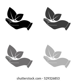 hand holds leaves  - black vector icon