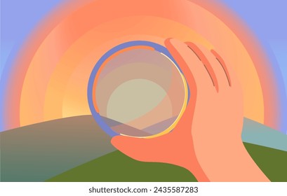 a hand holds a lens for a camera lens against the backdrop of a beautiful sunset in the mountains. photography concept
