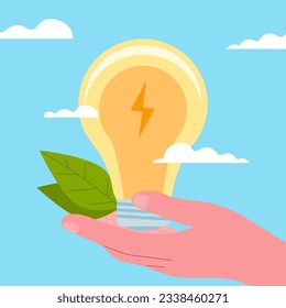 The hand holds a light bulb and leaves. Green energy. Caring for the resources of the planet.