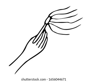 Hand holds a match. From the match comes the flame
