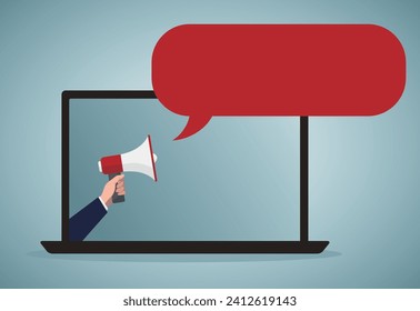 Hand holds a megaphone from screen of computer on a blue background. Concept of hiring, advertising, attention, email message marketing  concept, online conference, media promotion.