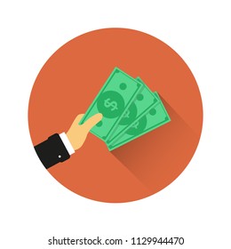 Hand holds money. Monetary currency. Paper money vector icon.