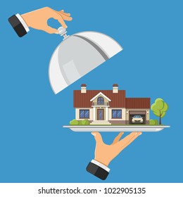 Hand holds new house on tray. Other hand holds cover. Flat style icons. Sale, purchase, lease, rent home of real estate concept. Isolated vector illustration