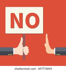 Hand holds NO sign