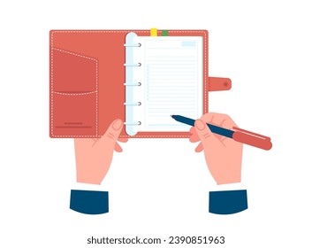 Hand holds paper daily planner. Write in organizer. Takes notes with pen. Tasks and goals planning. Deadline and agenda organize. Open notepad in arms. Time management