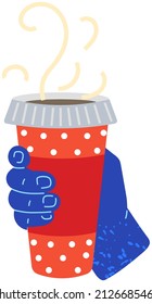 Hand holds paper glass with coffee isolated on white background. Dotted red container with warm drink. Take away, beverage to go. Hot coffee in bright glass. Cappuccino, espresso or americano in cup