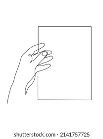 Hand holds paper sheet