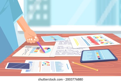 Hand holds pen and points to document with pie chart and information. Accessories for business meeting in office. Workplace with table, phone, tablets, pencil, sheet with text and diagrams for work