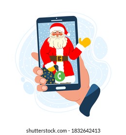 Hand holds a phone with a with a friendly smiling Santa’s contact. Snow falling on the background. Online Christmas concept. Cartoon vector illustration in flat style.