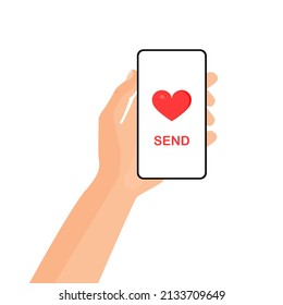 Hand holds a phone and sends a message on an isolated background.