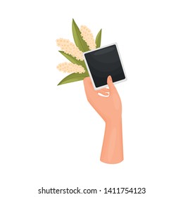 Hand holds a photo card of a and a bouquet of white inflorescences. Vector illustration on white background.