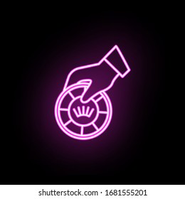 The hand holds a playing chip neon icon. Simple thin line, outline vector of casino icons for ui and ux, website or mobile application