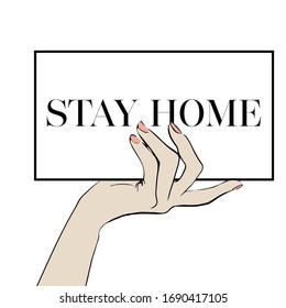 Hand holds a poster with the text stay home. Lettering typography poster with text for self quarantine times. Corona virus covid 19 campaign to stay at home. lifestyle activity that you can do at home