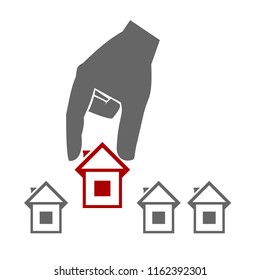 Hand holds selected house