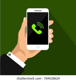 Hand holds smartphone with call on screen. Mockup phone calls.