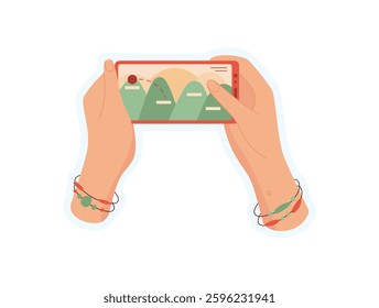 Hand holds smartphone with engaging app. User interacts with mobile device and screen. Digital application for entertainment, cool sticker for gaming media, chat, and technology.