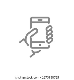 Hand holds a smartphone line icon. Social network activity, blogging, feedback symbol