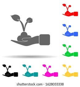 hand holds a sprout multi color style icon. Simple glyph, flat vector of ecology icons for ui and ux, website or mobile application