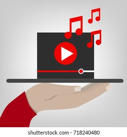 Hand holds a tablet with digital video player. Vector flat illustration.