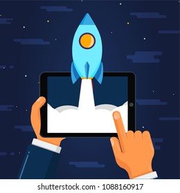 Hand holds a tablet with launch rocket. Business concept. Vector startup illustration. Start spaceship. 