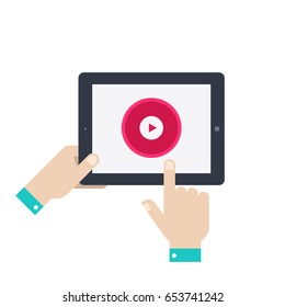 Hand holds a tablet with a play button. The hand presses the button. Flat design for web site, mobile app