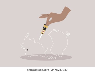 A hand holds a tube of glue, preparing to mend a broken piggy bank