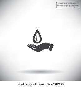 Hand holds water drop symbol. 