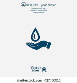 Hand holds water drop symbol. 