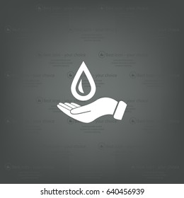 Hand holds water drop symbol. 