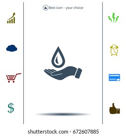 Hand holds water drop symbol. 