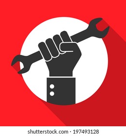 Hand holds a wrench, Repair icon on red background.