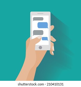Hand holing white smartphone similar to iphon with blank speech bubbles for text. Text messaging flat design concept. Eps 10 vector illustration