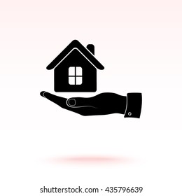 Hand with House sign icon, vector illustration. Flat design style 