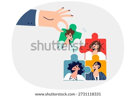 Hand of HR specialist building team to create strategic advantage over business competitors. Manager or recruiter organizes team building to strengthen connection between employees of corporation