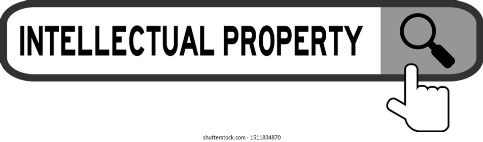 Hand icon over magnifier to find word intellectual property in search banner on white background