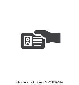 Mano con icono vectorial de tarjeta de identificación. signo plano relleno para concepto móvil y diseño web. Icono de glifo de tarjeta de identificación de mano. Símbolo, ilustración del logotipo. Gráficos vectoriales