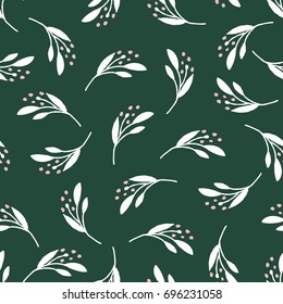 Hand illustrated seamless vector mistletoe Christmas background.  Hand drawn holiday or winter leaf and berry botanical pattern.