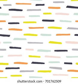 Hand illustrated seamless vector textured dash or line pattern.  Hand drawn retro or pastel colored horizontal stripe design on a white background.