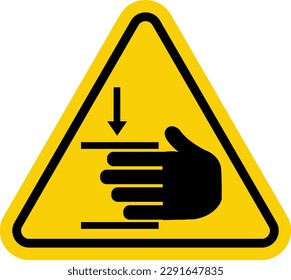 Hand injury sign. Hand crush sign. Pinching point. Warning sign. Yellow triangular sign with a silhouette of a hand and pressure inside. Risk of hand injury. The power of crushing hands from above.