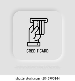 Hand inserting credit card in ATM slot thin line icon. Modern vector illustration.