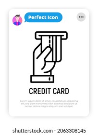 Hand inserting credit card in ATM slot thin line icon. Modern vector illustration.