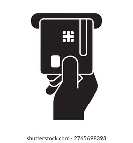 A hand inserting a credit card into an atm or payment terminal