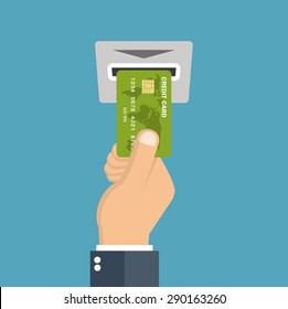 Hand inserting credit card into the atm slot - Flat style