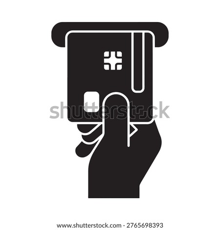 A hand inserting a credit card into an atm or payment terminal