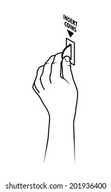 Hand inserting a round coin into a slot.