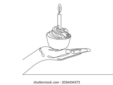 hand keep cake with candle.continuous line drawing