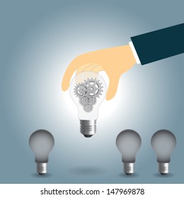 Hand keep up idea concept with gear in light bulb. Vector EPS10