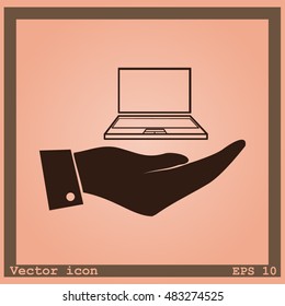 Hand with laptop icon