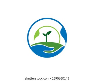 hand with leave holding land soil for sprout too grow in