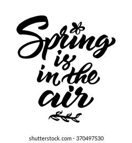 Hand lettered inspirational quote 'Spring is in the air'. Hand brushed ink lettering. Modern brush calligraphy. Vector illustration.